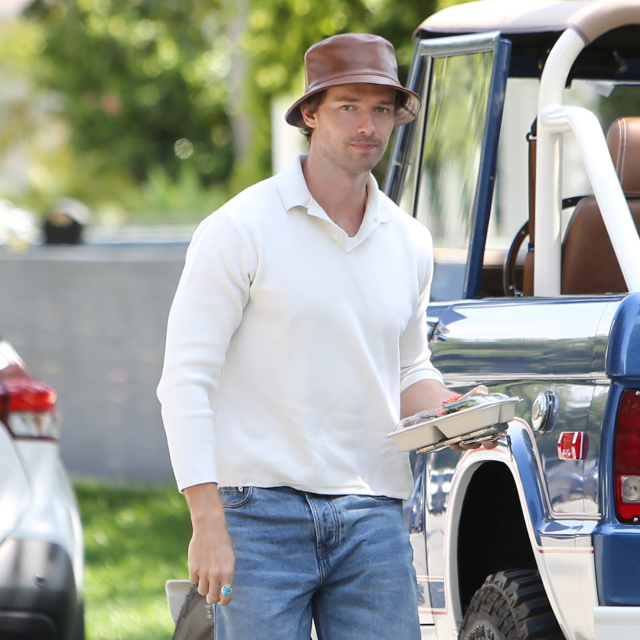Patrick Schwarznegger wearing jeans