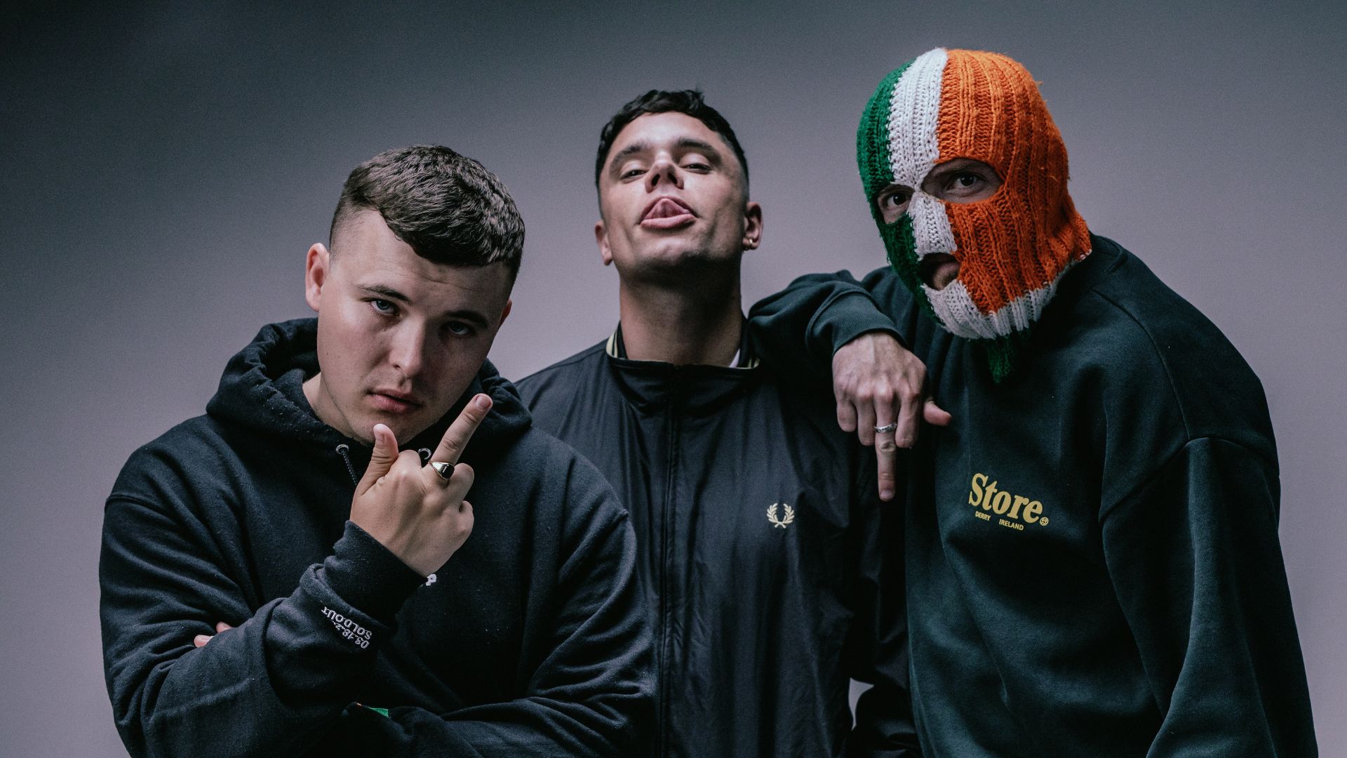 Mo Chara, Moglai Bap and DJ Próvaí of Kneecap