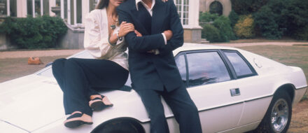 Barbara Bach and Roger Moore, stars of the The Spy Who Loved Me, leaning on the now-famous 'amphibious' Lotus Esprit.
