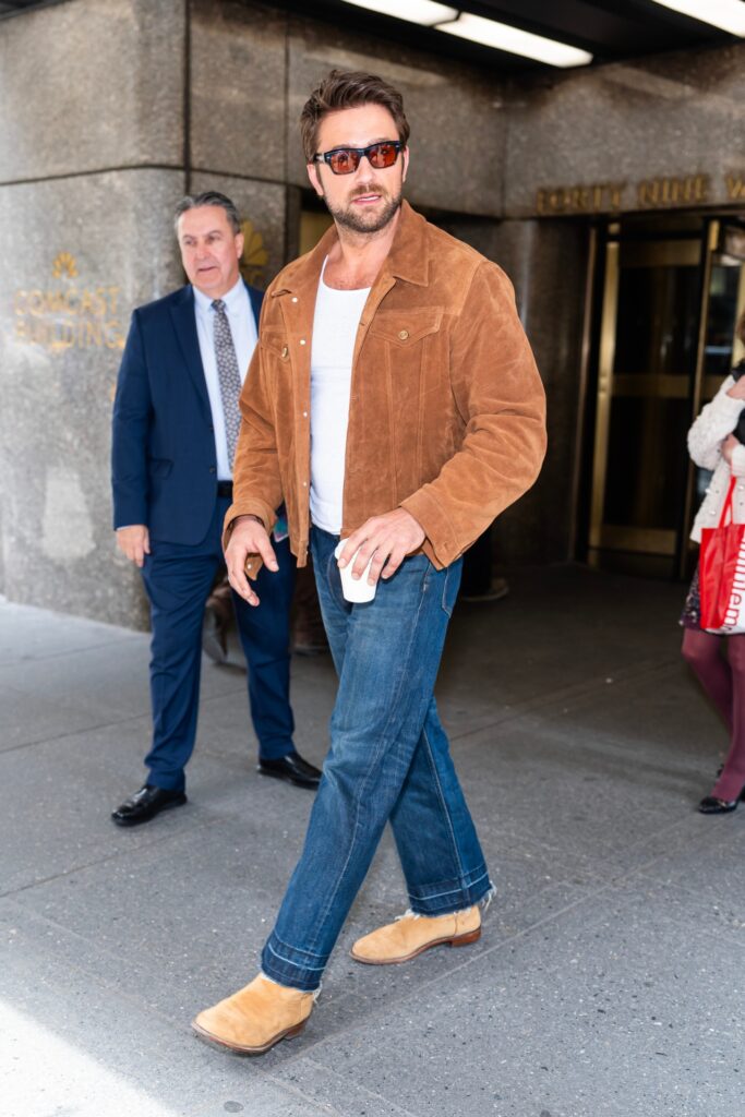 Brandon Sklenar wearing a suede jacket in new york