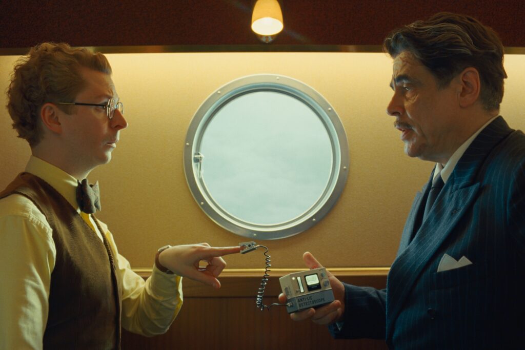 Michael Cera and Benicio del Toro in The Phoenician Scheme