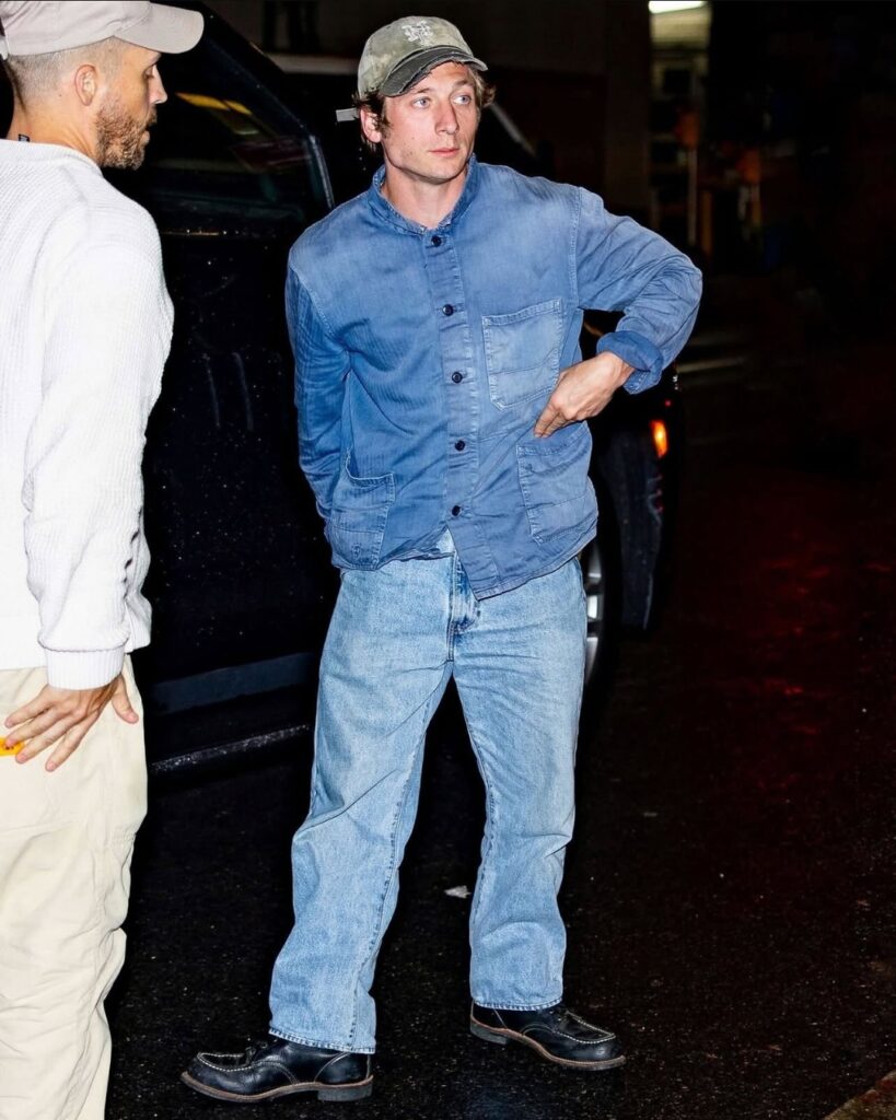 jeremy allen white wearing a french workwear jacket